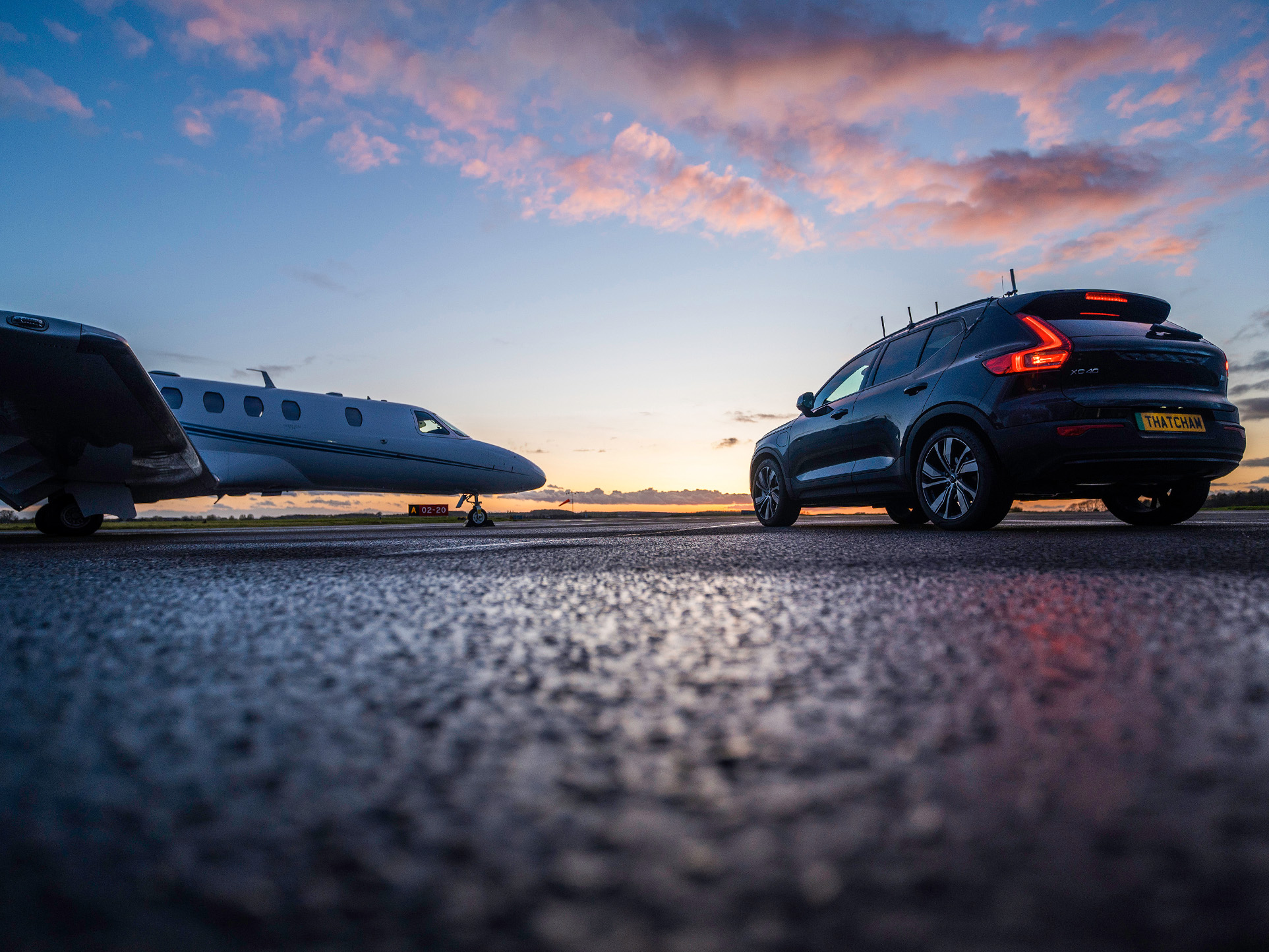 aircraft and car on the runway of the airfield at Gamston